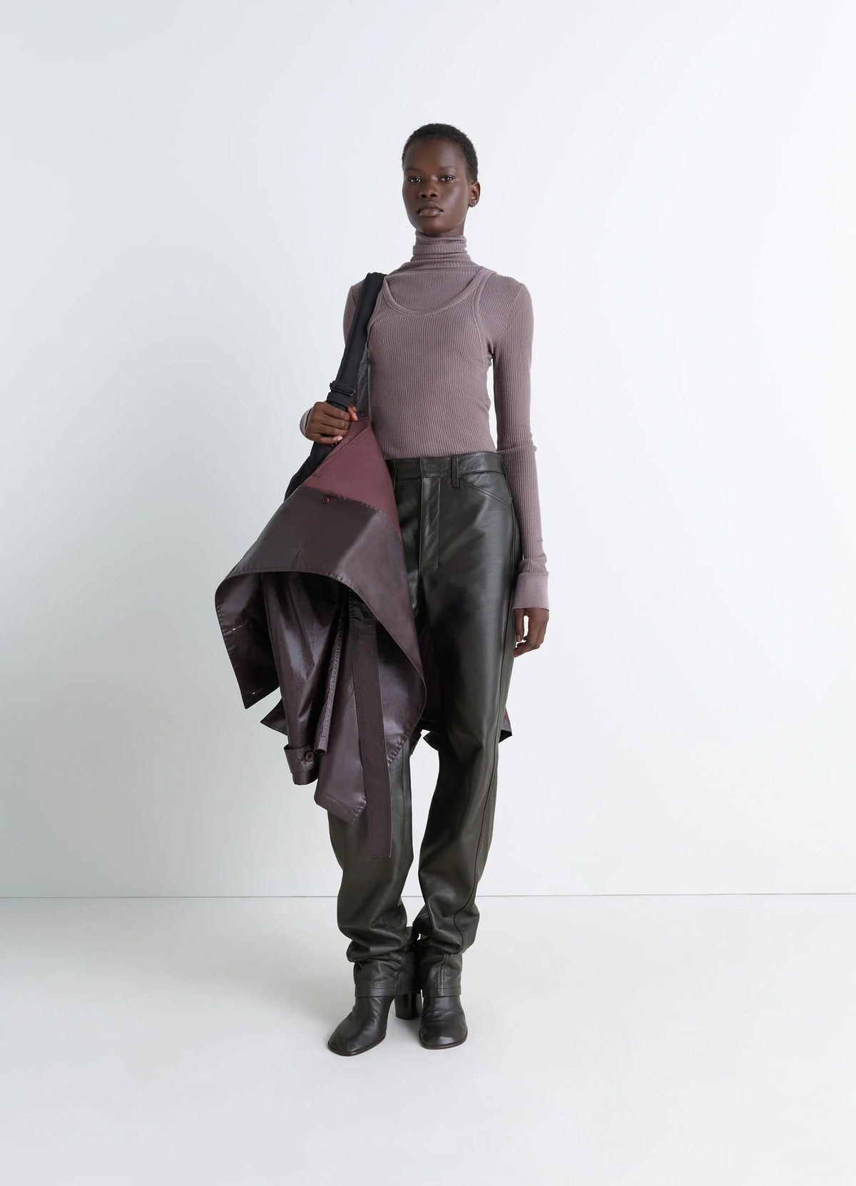 LEATHER FIVE POCKETS TWISTED PANTS